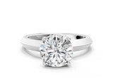 Platinum Round Cut Solitaire Engagement Ring with Flat Band and Four-Prong Setting