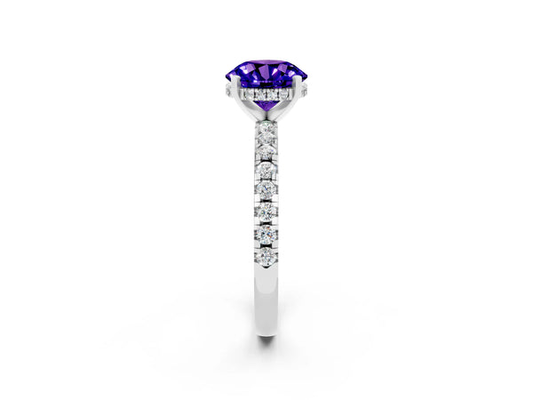 Platinum Round Cut Tanzanite Solitaire Ring with Round Pavé Band and Four-Prong Setting
