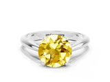 Platinum Round Cut Yellow Sapphire Solitaire Engagement Ring with Cathedral Setting and Four-Prong Mount_12