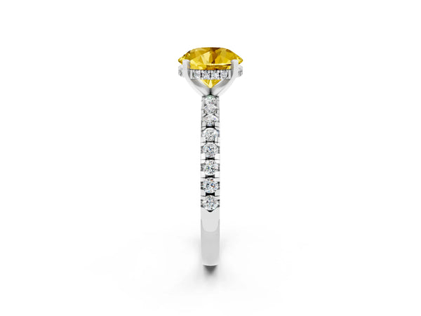 Platinum Round Cut Yellow Sapphire Solitaire Ring with Round Pavé Band and Four-Prong Setting