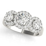 Platinum Round Diamond Three-Stone Halo Ring with Prong Setting and Pavé Accents