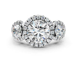 Platinum Round Diamond Three-Stone Halo Ring with Prong Setting and Pavé Accents_14