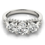 Platinum Round Diamond Three-Stone Ring with Prong Setting and Pavé Band 1