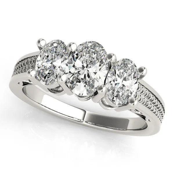 Platinum Round Diamond Three-Stone Ring with Prong Setting and Textured Band