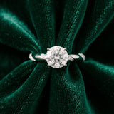 Platinum Round Solitaire Diamond Engagement Ring with Twisted Pave Band and Four-Prong Setting
