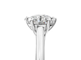 Platinum Round Solitaire Engagement Ring with Six-Prong Setting and Classic Band