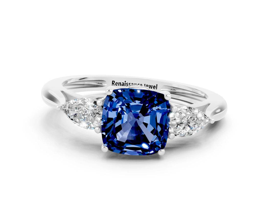 Platinum Three-Stone Cushion Cut Blue Sapphire Ring with Pear  Side Stones in Four-Prong Setting_54