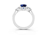 Platinum Three-Stone Cushion Cut Blue Sapphire Ring with Pear  Side Stones in Four-Prong Setting_57