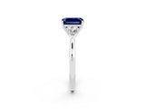 Platinum Three-Stone Emerald Cut Blue Sapphire Ring with Pear  Side Stones in Four-Prong Setting_56