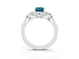 Platinum Three-Stone Emerald Cut Blue Topaz Ring with Pear  Side Stones in Four-Prong Setting_57