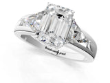 Platinum Three-Stone Emerald Cut Cut Diamond Ring with Trillion Side Stones on a Split Shank Band_14