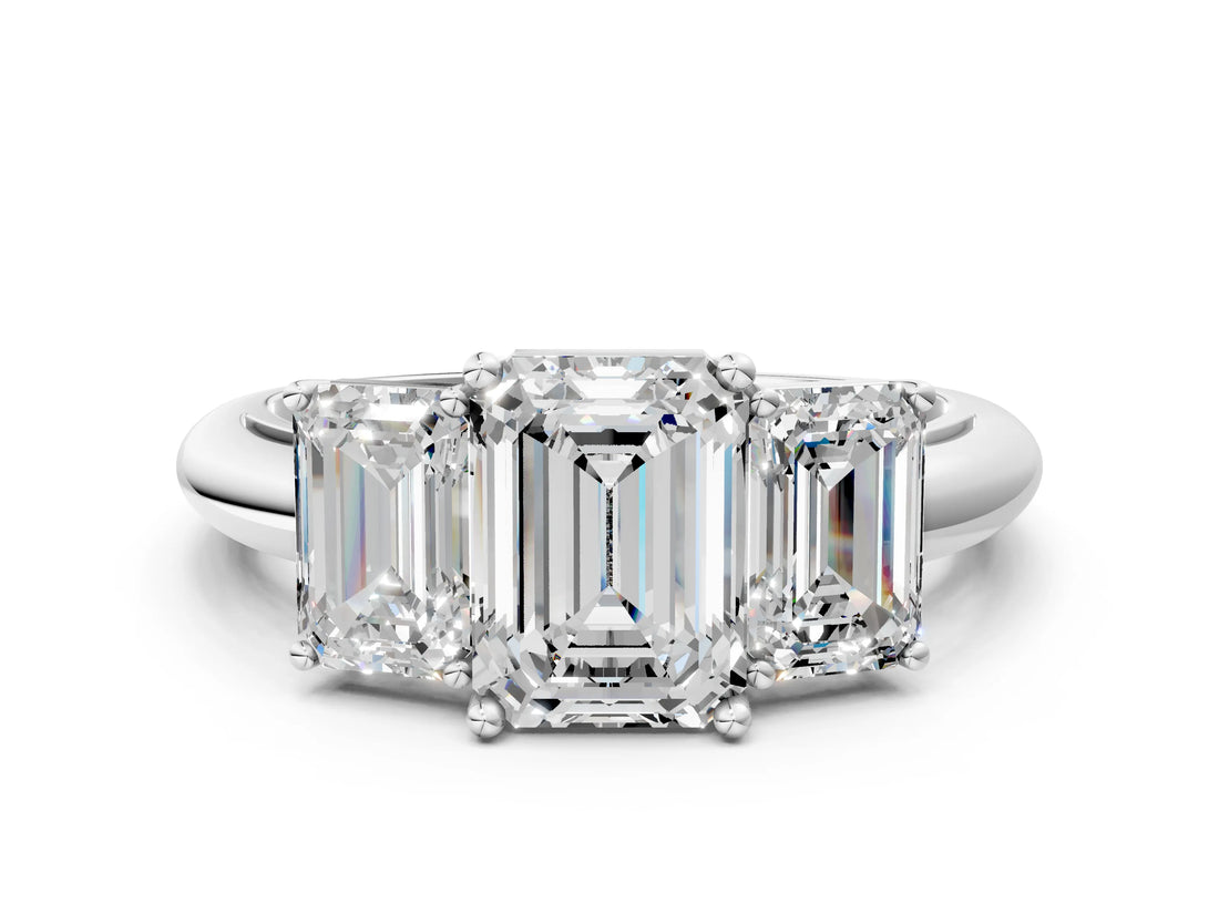 Platinum Three-Stone Emerald Cut Diamond Engagement Ring with Prong Setting on a White Gold Band_42