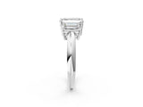 Platinum Three-Stone Emerald Cut Diamond Engagement Ring with Prong Setting on a White Gold Band_44