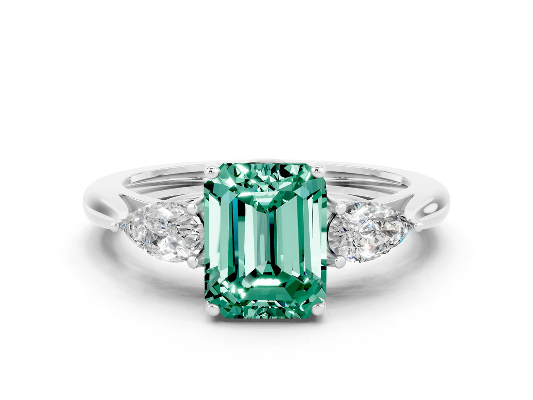 Platinum Three-Stone Emerald Cut Green Sapphire Ring with Pear  Side Stones in Four-Prong Setting_54