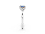 Platinum Three-Stone Emerald Cut Moissanite Ring with Pear  Side Stones in Four-Prong Setting_56