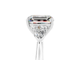 Platinum Three-Stone Emerald Cut Moissanite Ring with Pear  Side Stones in Four-Prong Setting_59