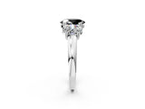 Platinum Three-Stone Fancy Black Oval Cut Cut Diamond Ring with Channel Set Band and Four-Prong Setting_32