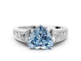 Platinum Three-Stone Fancy Blue Heart Cut Cut Diamond Ring with Trillion Side Stones on a Split Shank Band_84