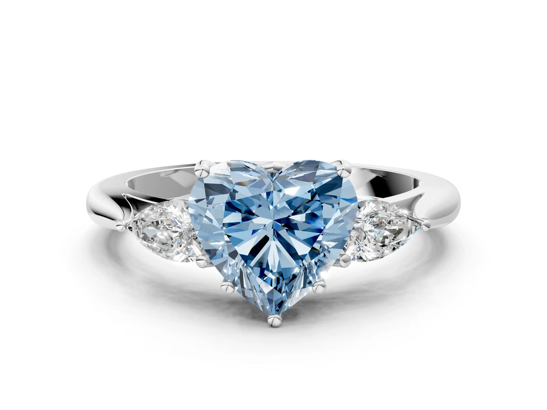 Platinum Three-Stone Fancy Blue Heart Cut Diamond Ring with Pear  Side Stones in Four-Prong Setting_12