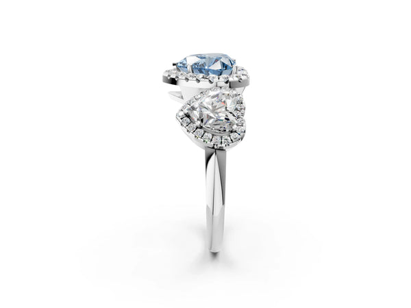 Platinum Three-Stone Fancy Blue Heart Cut Halo Diamond Ring with Pave Band and Four-Prong Setting
