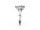 Platinum Three-Stone Fancy Blue Marquise  Brilliant Cut Solitaire Ring with Prong Setting on a Classic Band 2