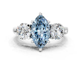 Platinum Three-Stone Fancy Blue Marquise  Brilliant Cut Solitaire Ring with Prong Setting on a Classic Band