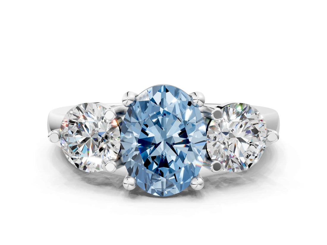 Platinum Three-Stone Fancy Blue Oval  Brilliant Cut Solitaire Ring with Prong Setting on a Classic Band 2