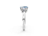 Platinum Three-Stone Fancy Blue Oval Cut Cut Diamond Ring with Channel Set Band and Four-Prong Setting_26