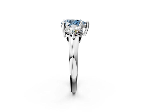 Platinum Three-Stone Fancy Blue Pear  Brilliant Cut Solitaire Ring with Prong Setting on a Classic Band