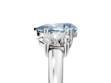 Platinum Three-Stone Fancy Blue Pear Cut Cut Diamond Ring with Channel Set Band and Four-Prong Setting_24