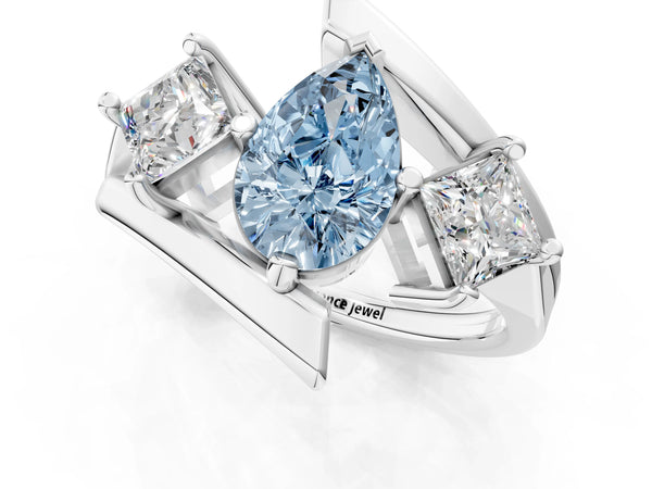 Platinum Three-Stone Fancy Blue Pear Cut Cut Tension Band Ring with Four-Prong Setting