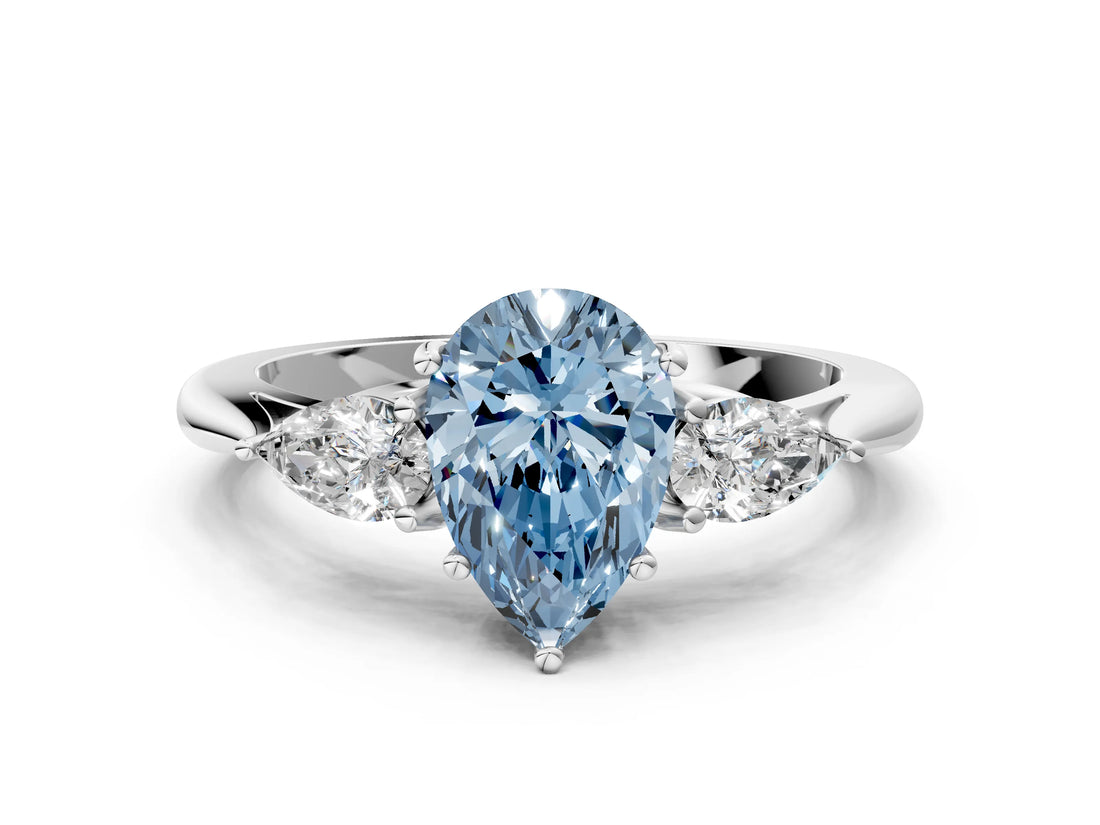 Platinum Three-Stone Fancy Blue Pear Cut Diamond Ring with Pear  Side Stones in Four-Prong Setting_12
