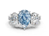 Platinum Three-Stone Fancy Blue Pear  Diamond Milgrain Pave Band with Prong Setting