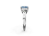Platinum Three-Stone Fancy Blue Radiant  Brilliant Cut Solitaire Ring with Prong Setting on a Classic Band 3