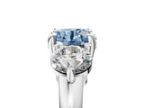Platinum Three-Stone Fancy Blue Round  Brilliant Cut Solitaire Ring with Prong Setting on a Classic Band