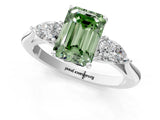 Platinum Three-Stone Fancy Green Emerald Cut Diamond Ring with Pear  Side Stones in Four-Prong Setting_13