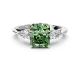 Platinum Three-Stone Fancy Green Radiant Cut Diamond Ring with Pear  Side Stones in Four-Prong Setting_12