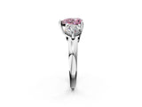 Platinum Three-Stone Fancy Pink Heart  Brilliant Cut Solitaire Ring with Prong Setting on a Classic Band 3