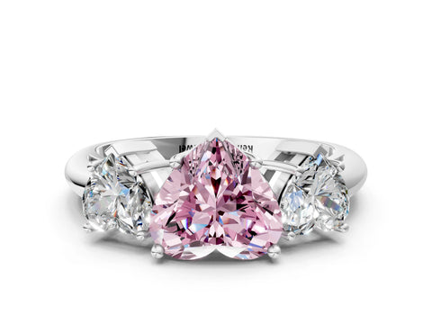 Platinum Three-Stone Fancy Pink Heart Cut Cut Diamond Engagement Ring with Prong Setting on a White Gold Band_48
