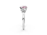 Platinum Three-Stone Fancy Pink Heart Cut Cut Diamond Ring with Channel Set Band and Four-Prong Setting_27