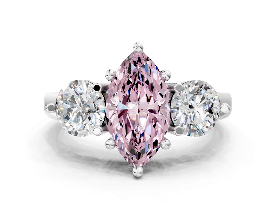 Platinum Three-Stone Fancy Pink Marquise  Brilliant Cut Solitaire Ring with Prong Setting on a Classic Band