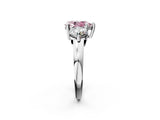 Platinum Three-Stone Fancy Pink Pear  Brilliant Cut Solitaire Ring with Prong Setting on a Classic Band 2