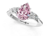 Platinum Three-Stone Fancy Pink Pear Cut Diamond Ring with Pear  Side Stones in Four-Prong Setting_13