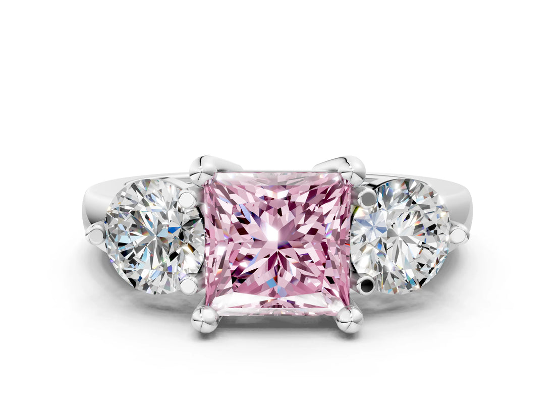 Platinum Three-Stone Fancy Pink Princess  Brilliant Cut Solitaire Ring with Prong Setting on a Classic Band 1