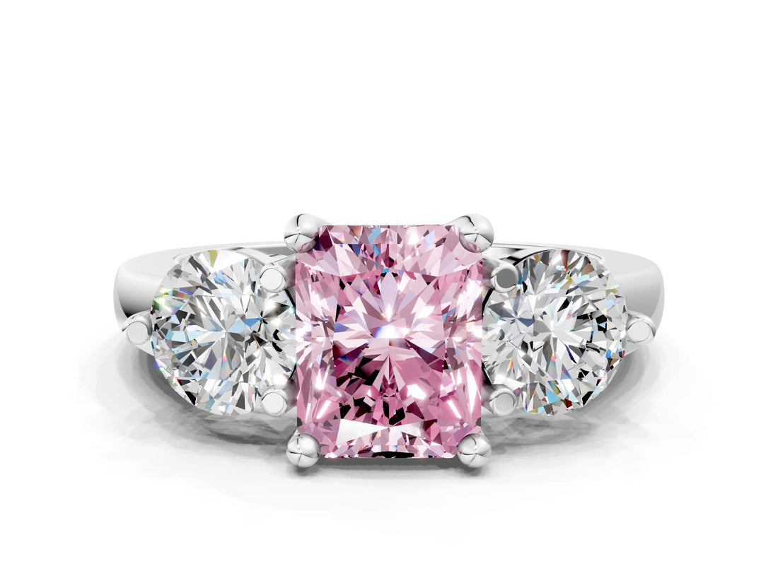 Platinum Three-Stone Fancy Pink Radiant  Brilliant Cut Solitaire Ring with Prong Setting on a Classic Band