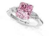 Platinum Three-Stone Fancy Pink Radiant Cut Diamond Ring with Pear  Side Stones in Four-Prong Setting_13
