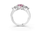 Platinum Three-Stone Fancy Pink Round  Brilliant Cut Solitaire Ring with Prong Setting on a Classic Band