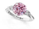Platinum Three-Stone Fancy Pink Round Cut Diamond Ring with Pear  Side Stones in Four-Prong Setting_13