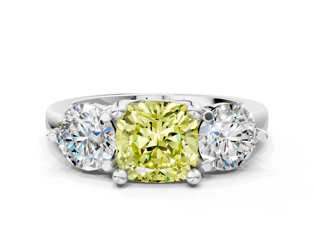 Platinum Three-Stone Fancy Yellow Cushion  Brilliant Cut Solitaire Ring with Prong Setting on a Classic Band