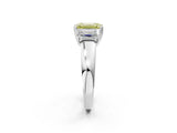 Platinum Three-Stone Fancy Yellow Emerald Cut Cut Diamond Ring with Channel Set Band and Four-Prong Setting_26